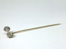 alfiler oro 18k con diamante 