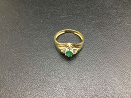 anillo oro 18k con circonita,olivina 
