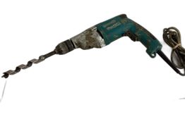 taladro electrico makita dp4011