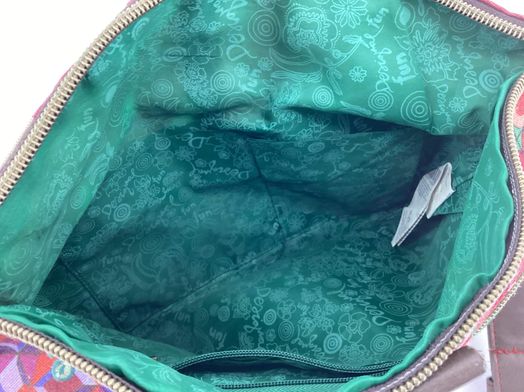 mala al&ccedil;a comprida desigual