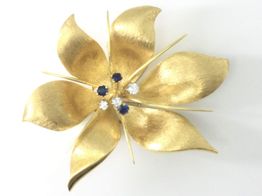 broche oro 18k con diamante 