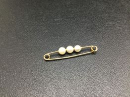 broche oro 18k con circonita 