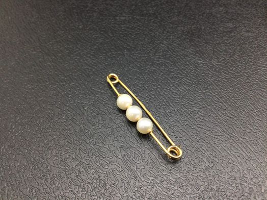 broche oro 18k con circonita 