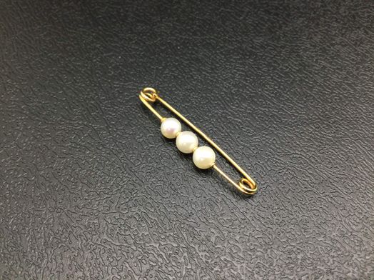 broche oro 18k con circonita 