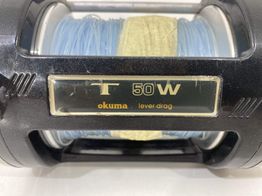 carrete pesca okuma titus