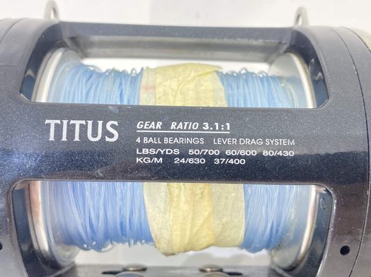 carrete pesca okuma titus
