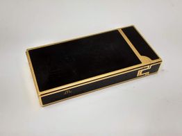 encendedor maurice lacroix dorado y negro