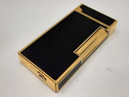 encendedor maurice lacroix dorado y negro