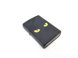 encendedor zippo ojos