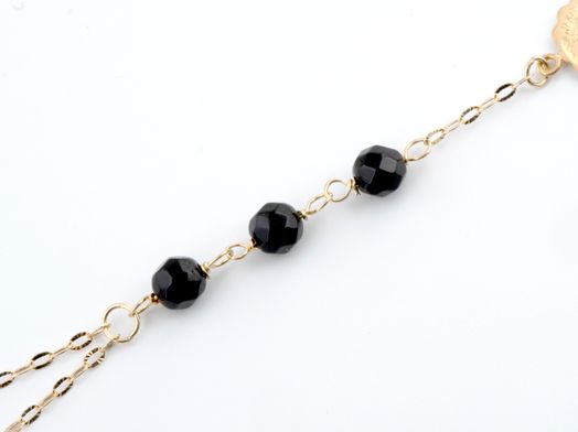 manita oro 18k con onix 
