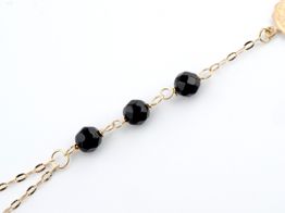 manita oro 18k con onix 