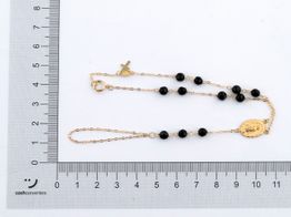 manita oro 18k con onix 