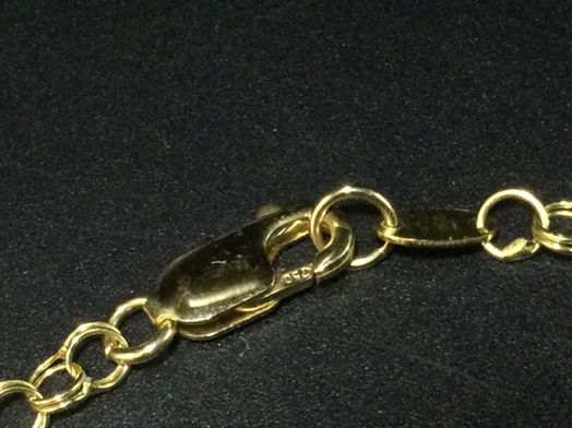 manita oro 18k con circonita 