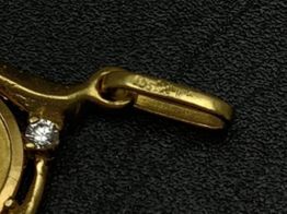 medalla oro 18k con circonita 