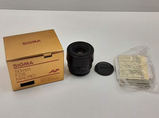 objetivo sigma 50mm  1:28