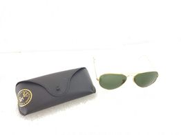 &oacute;culos de sol homem rayban dourado