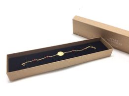 pulsera oro 18k con coral 