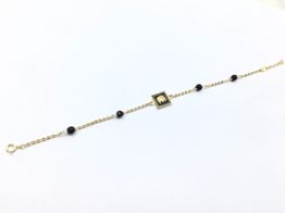 pulsera oro 18k con onix 