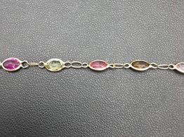 pulsera oro 18k con aguamarina,amatista,circonita,cuarzo,olivina,turquesa 