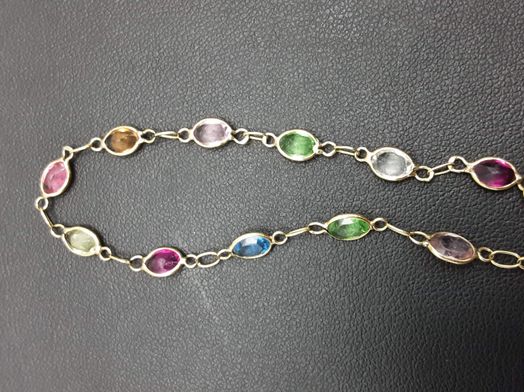 pulsera oro 18k con aguamarina,amatista,circonita,cuarzo,olivina,turquesa 