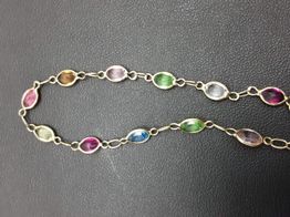 pulsera oro 18k con aguamarina,amatista,circonita,cuarzo,olivina,turquesa 