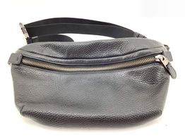riñonera de marca coach