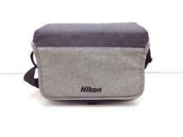 saco camara nikon cinza