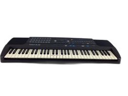 teclado electronico roland e-12